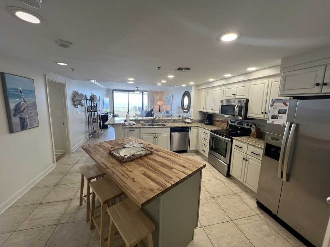 Fully Stocked Kitchen with All Appliances and Butcher Block Island. 