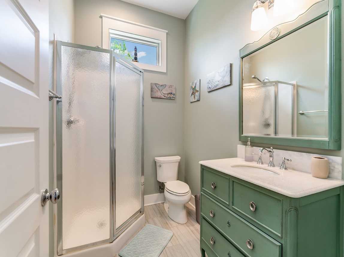 Part of the 3rd bedroom, top floor queen suite w/ full bath &amp; private balcony