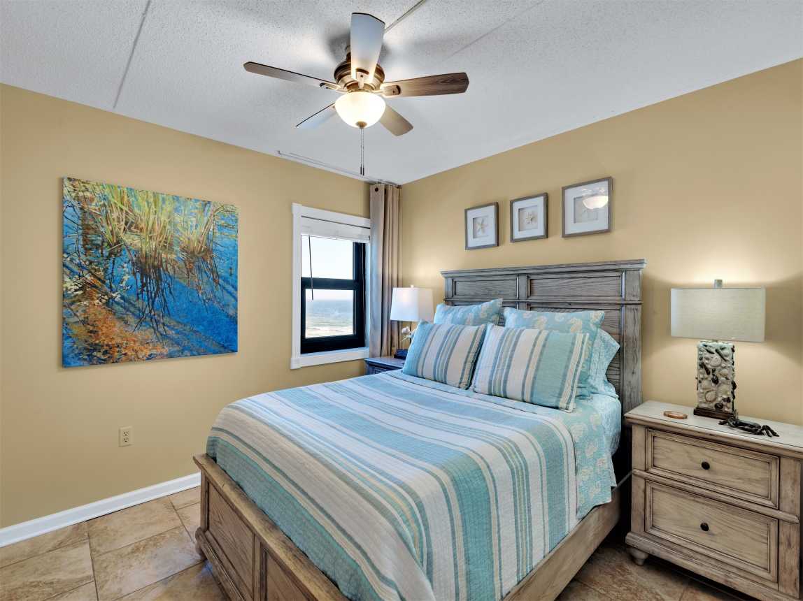 Queen bedroom has view of the beach.