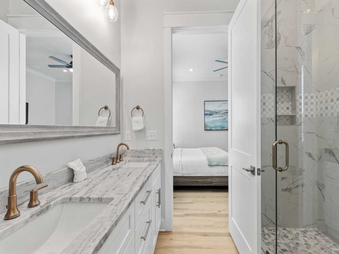 Primary Bathroom Double Vanity and Walk-in Shower