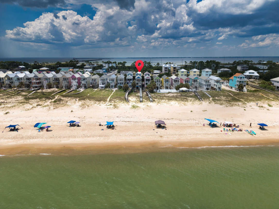 Drone View of Beach and Home