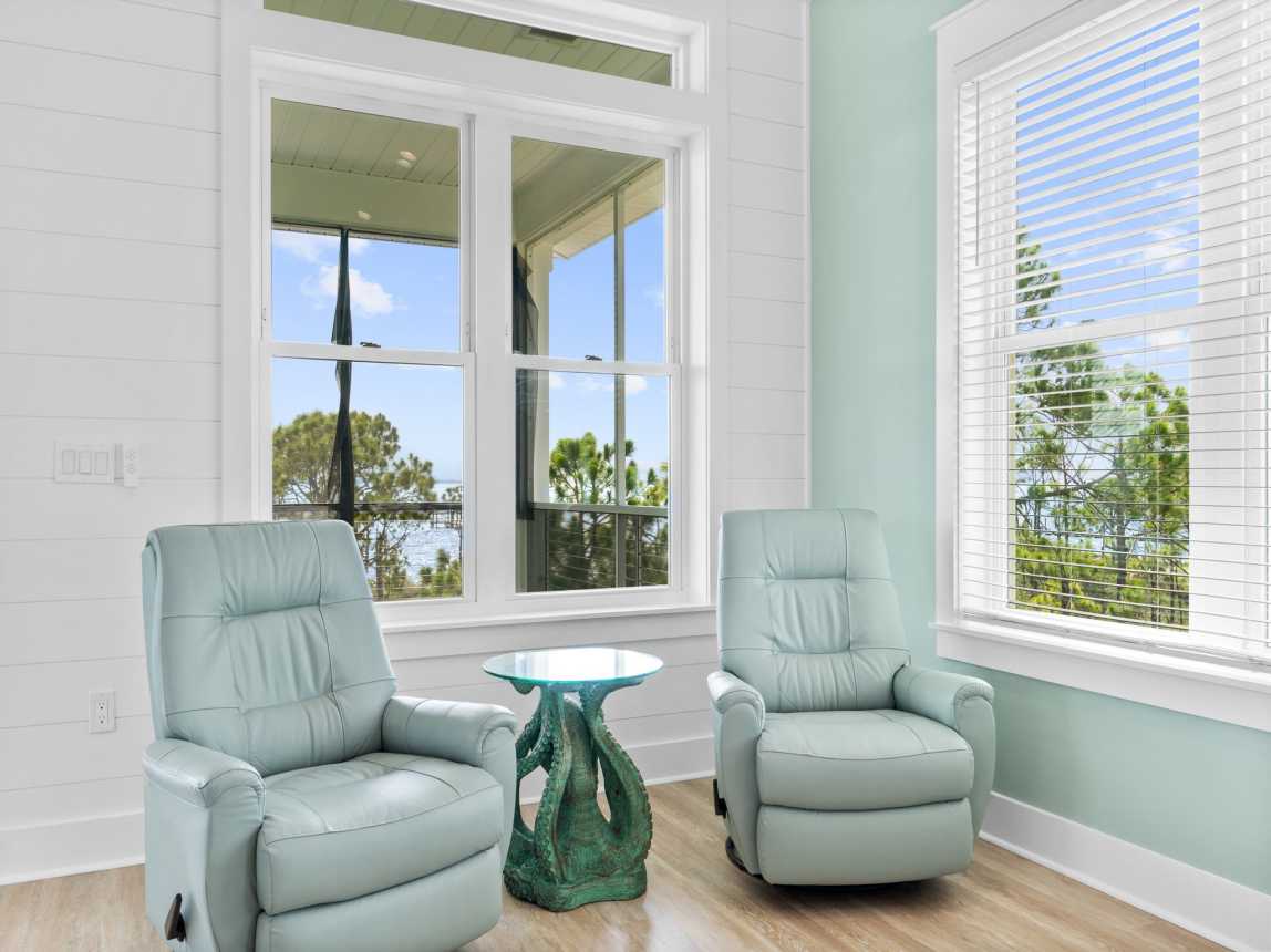 Comfortable leather swivel recliners and our Octopus Table!