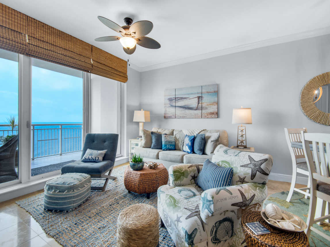 Bright, crisp living area with gulf front balcony 