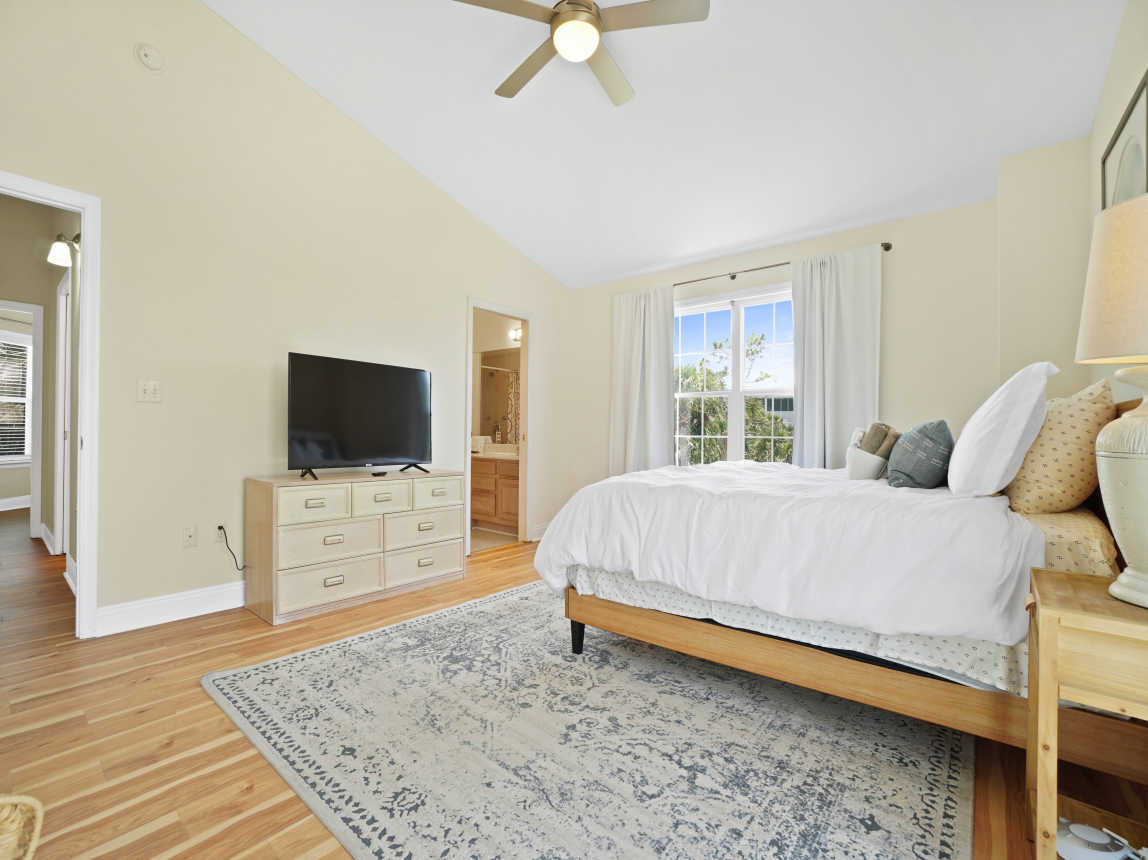 Upstairs master suite; king bed, en suite bathroom, deck.