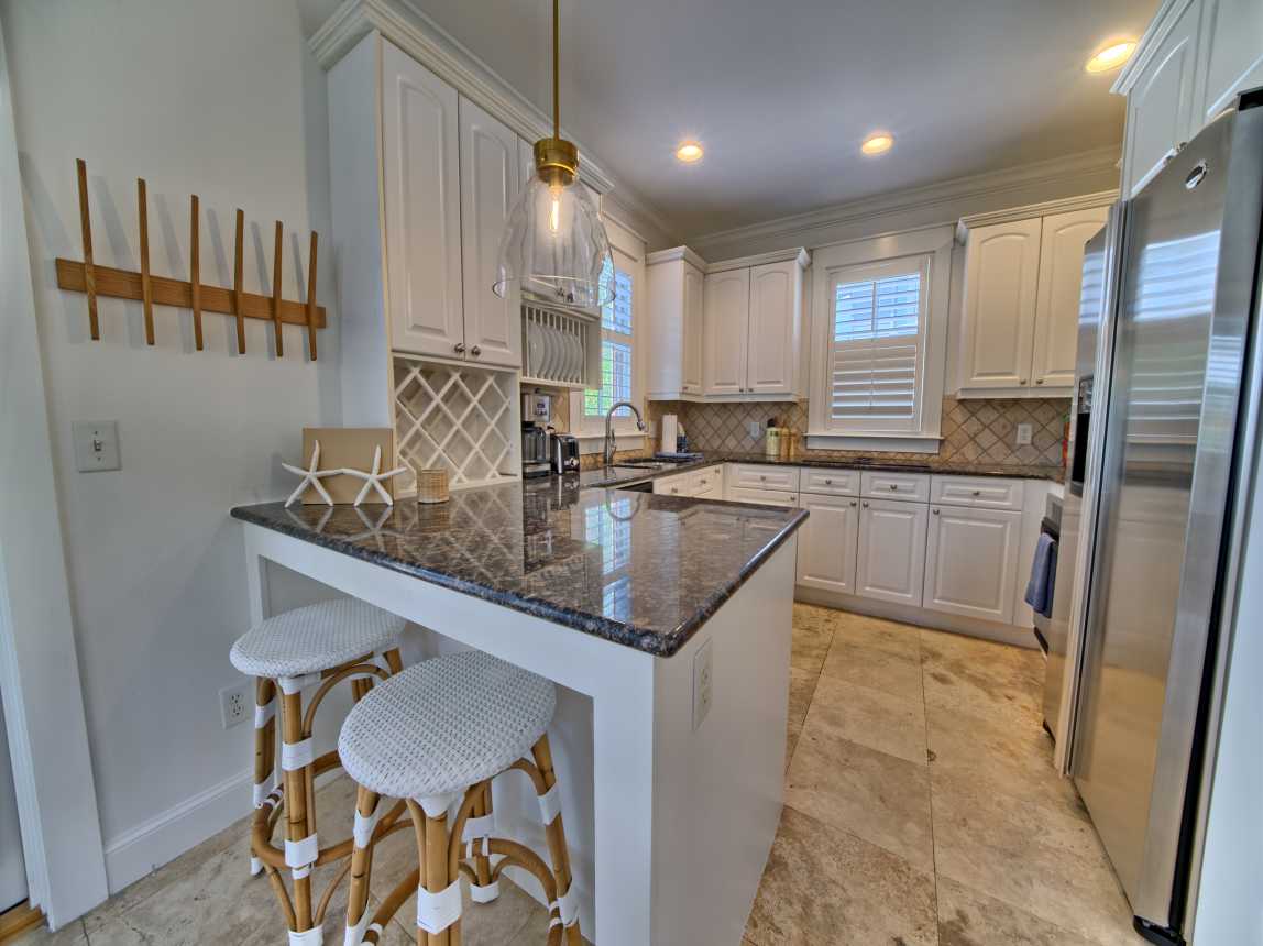 Counter height eat on bar with 2 bistro bar stools.