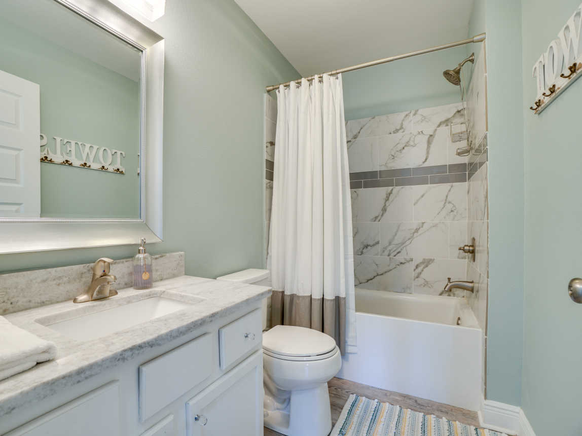 Hall Bath with tub/shower combo.