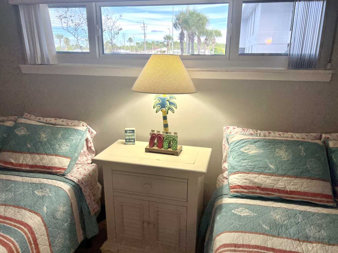 QUEEN SIZE BEDS with TV, Bath Access, and Walk-in Closet await your GUESTS!