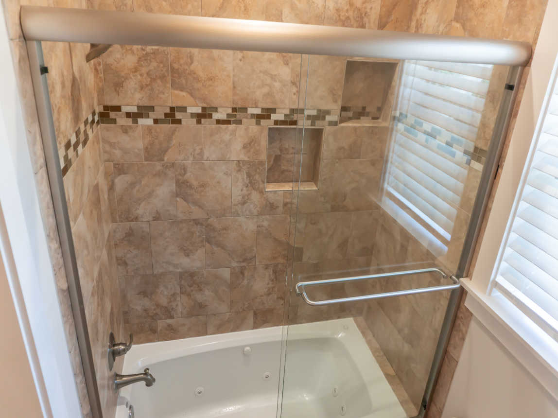 Second Floor Jack and Jill Bathroom with double sinks and shower and jacuzzi/tub