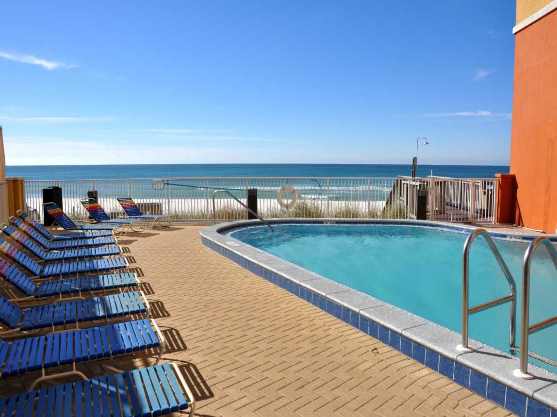 A heated indoor/outdoor pool awaits while one can gaze out to the sea.