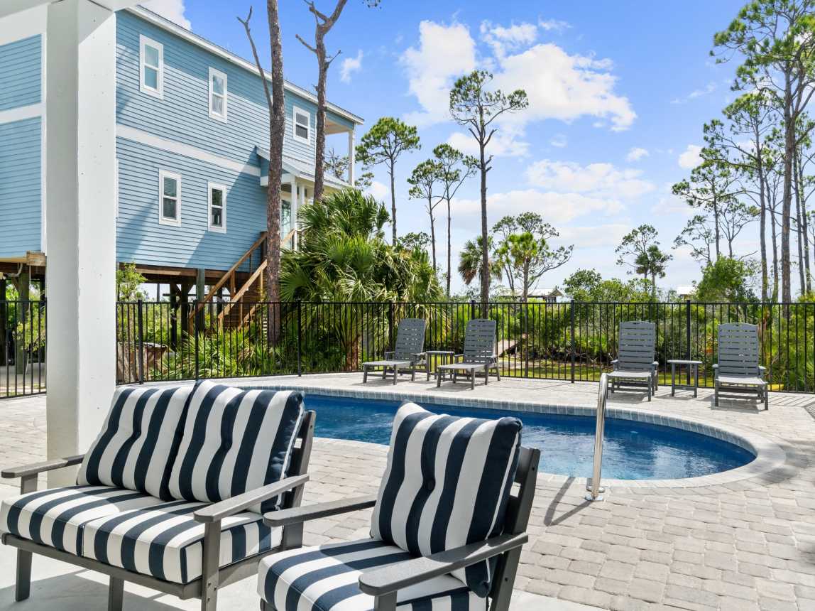 Sit back by the pool after a long day in the sun! TV, pool and Hot Tub!