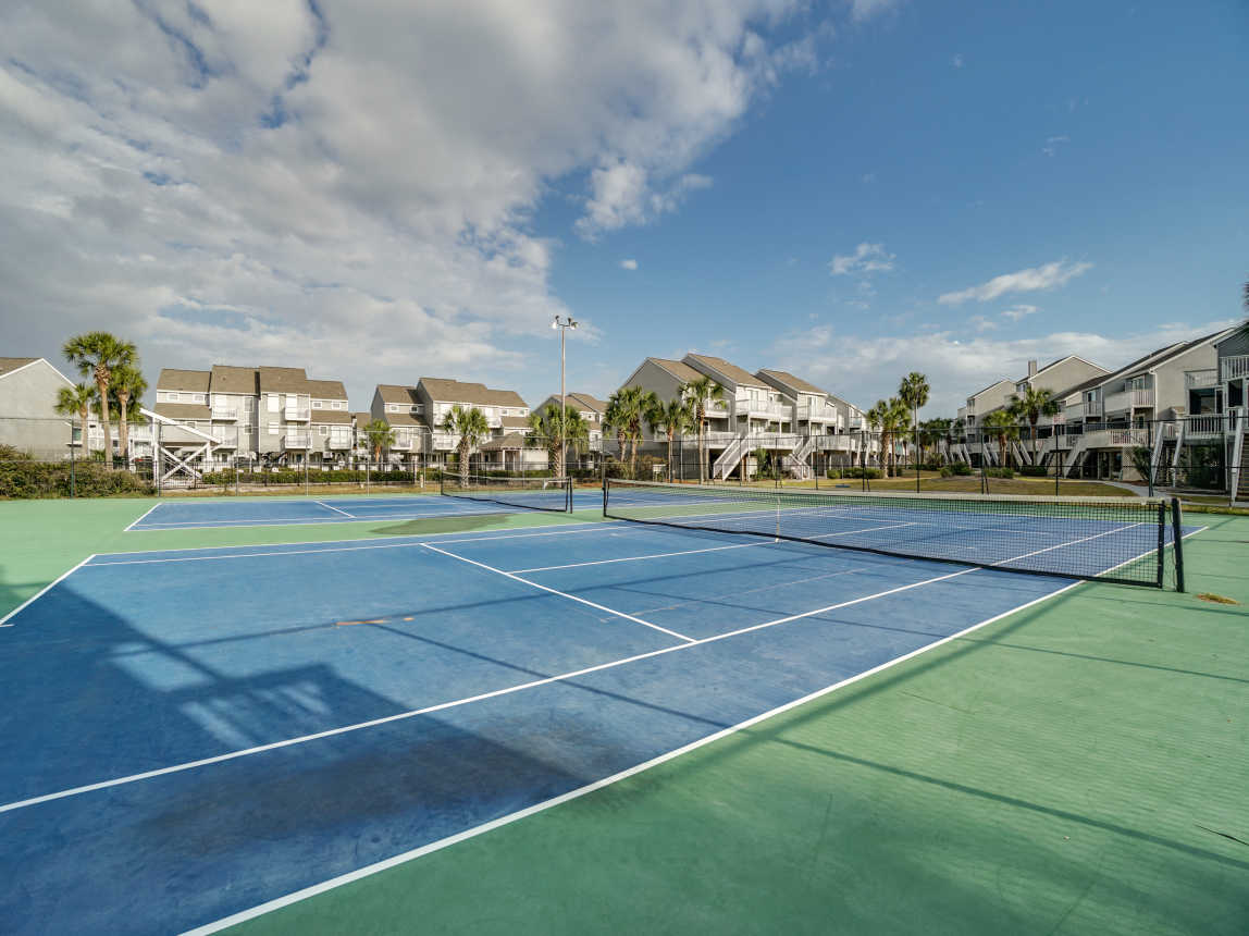 Community tennis courts a short walk from the home.