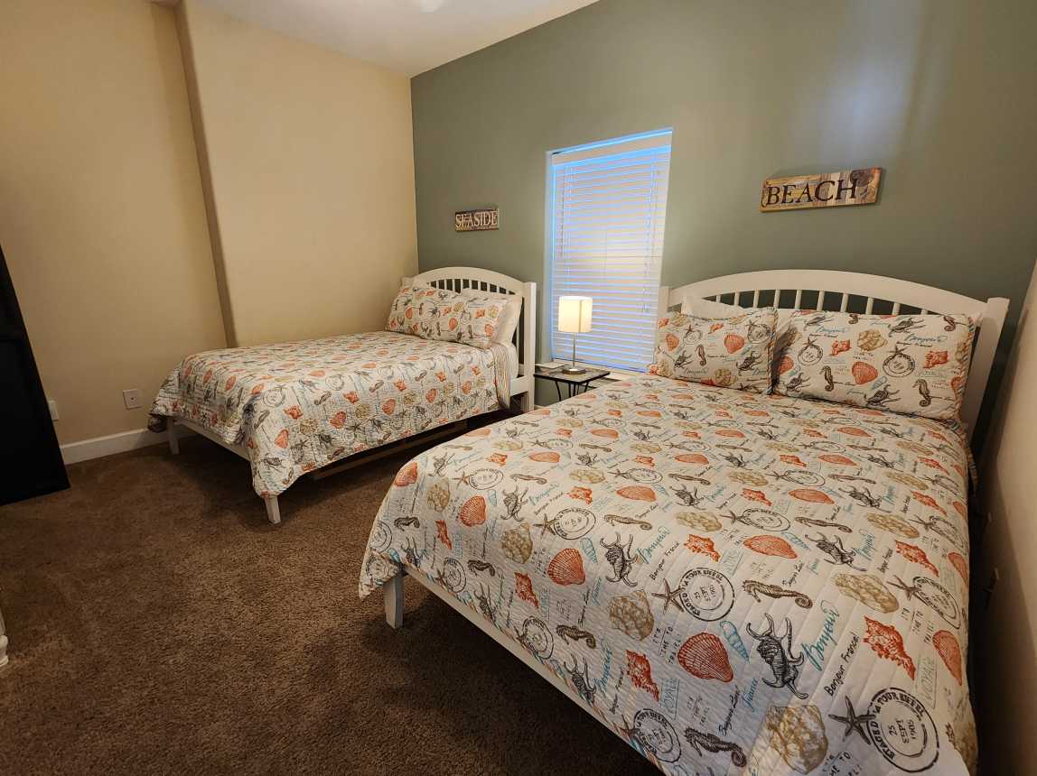  Double beds in 2nd bedroom to offer flexibility in sleeping arrangements.