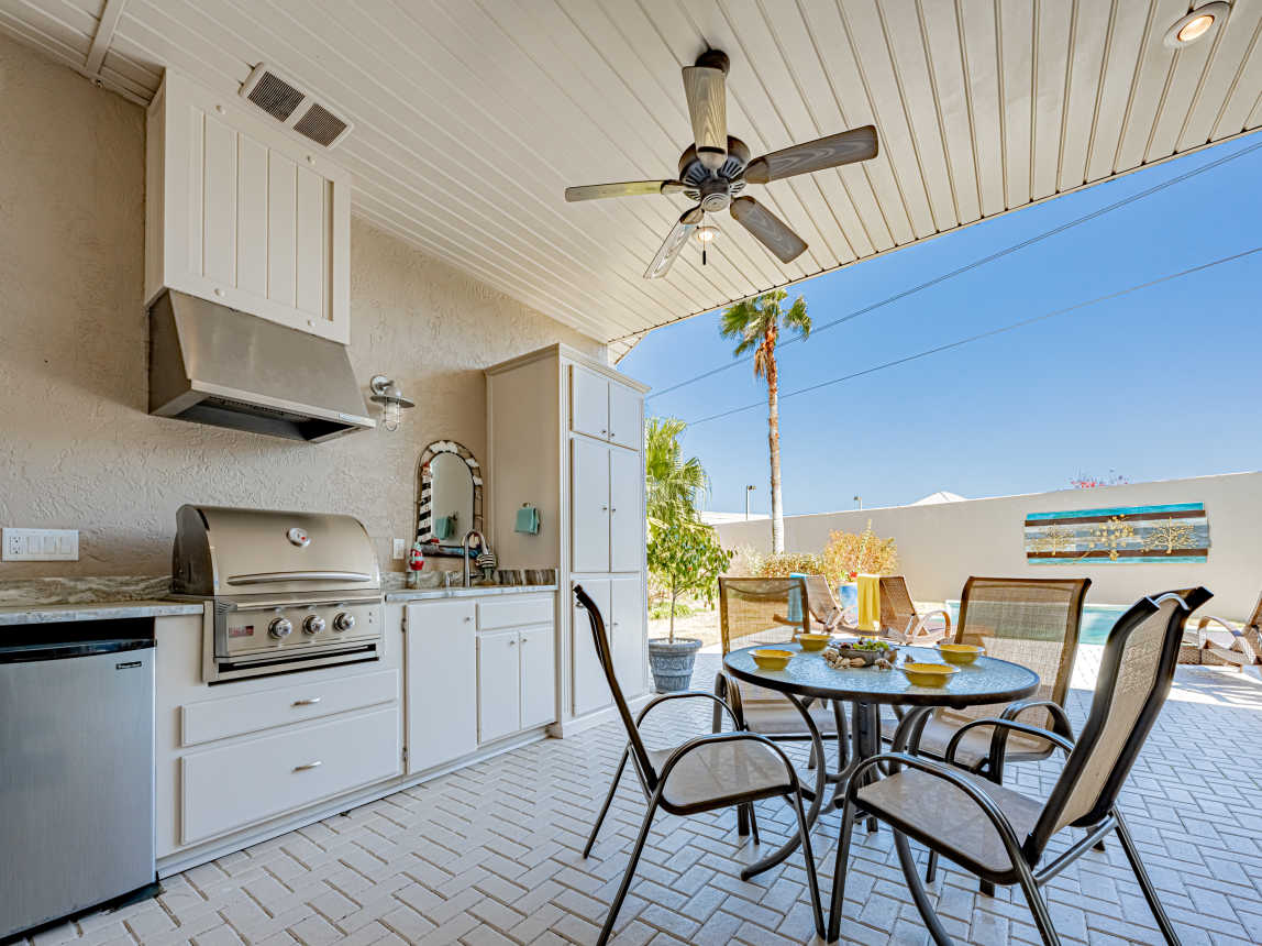Outdoor Kitchen and Dining right by the pool