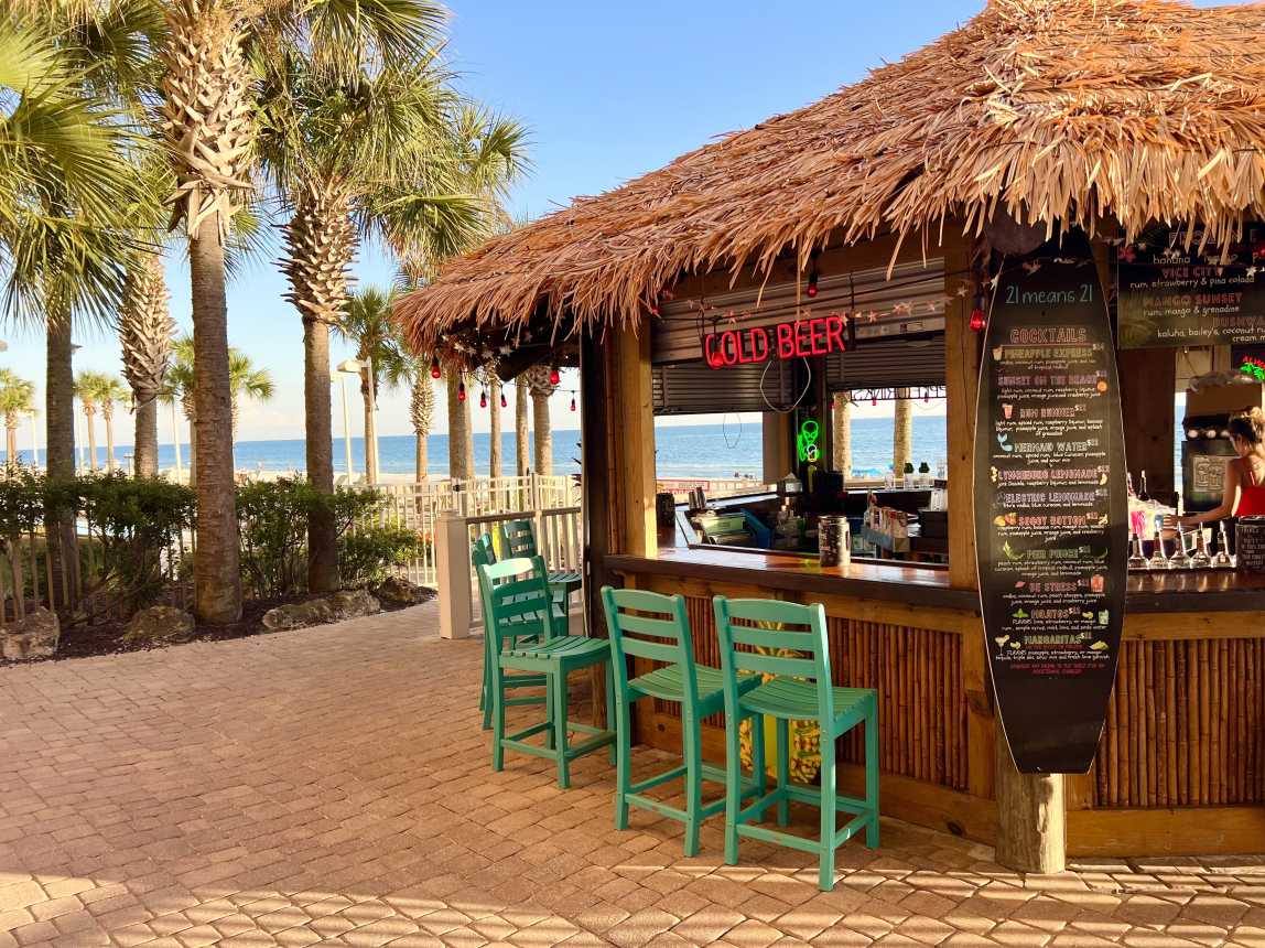 Enjoy the TIKI bar between the pools for a refreshing cocktail or smoothie!