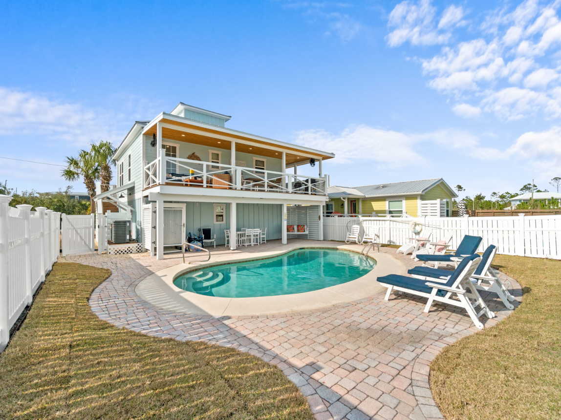 Back Exterior Covered Patio/Deck and Pool Area