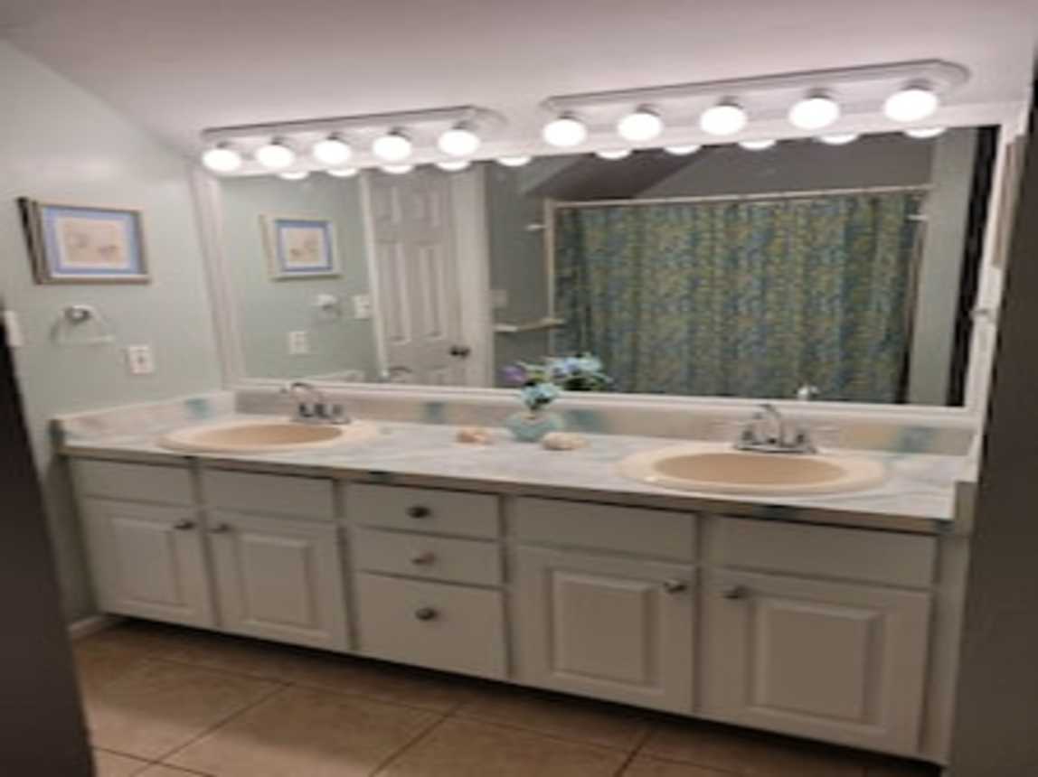 Upper bathroom connecting main king bedroom and bunk area