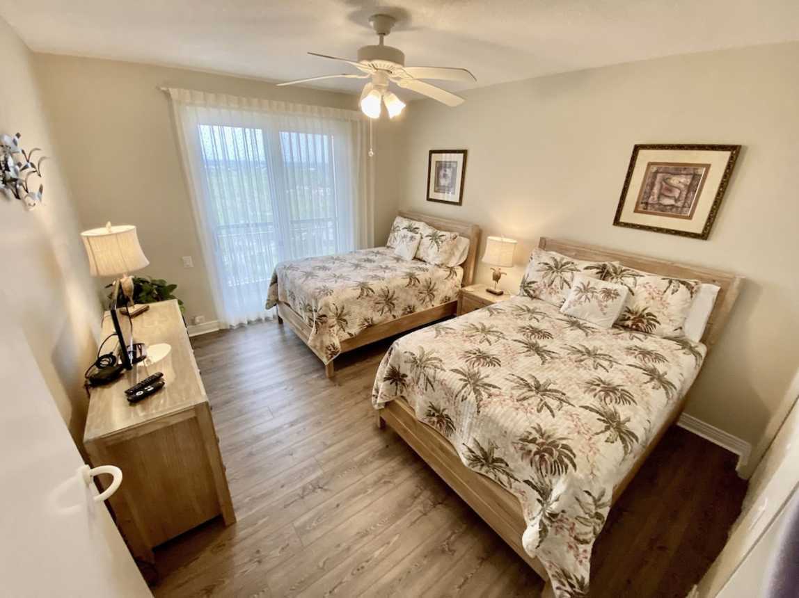 2nd Bedroom with double beds and private bath