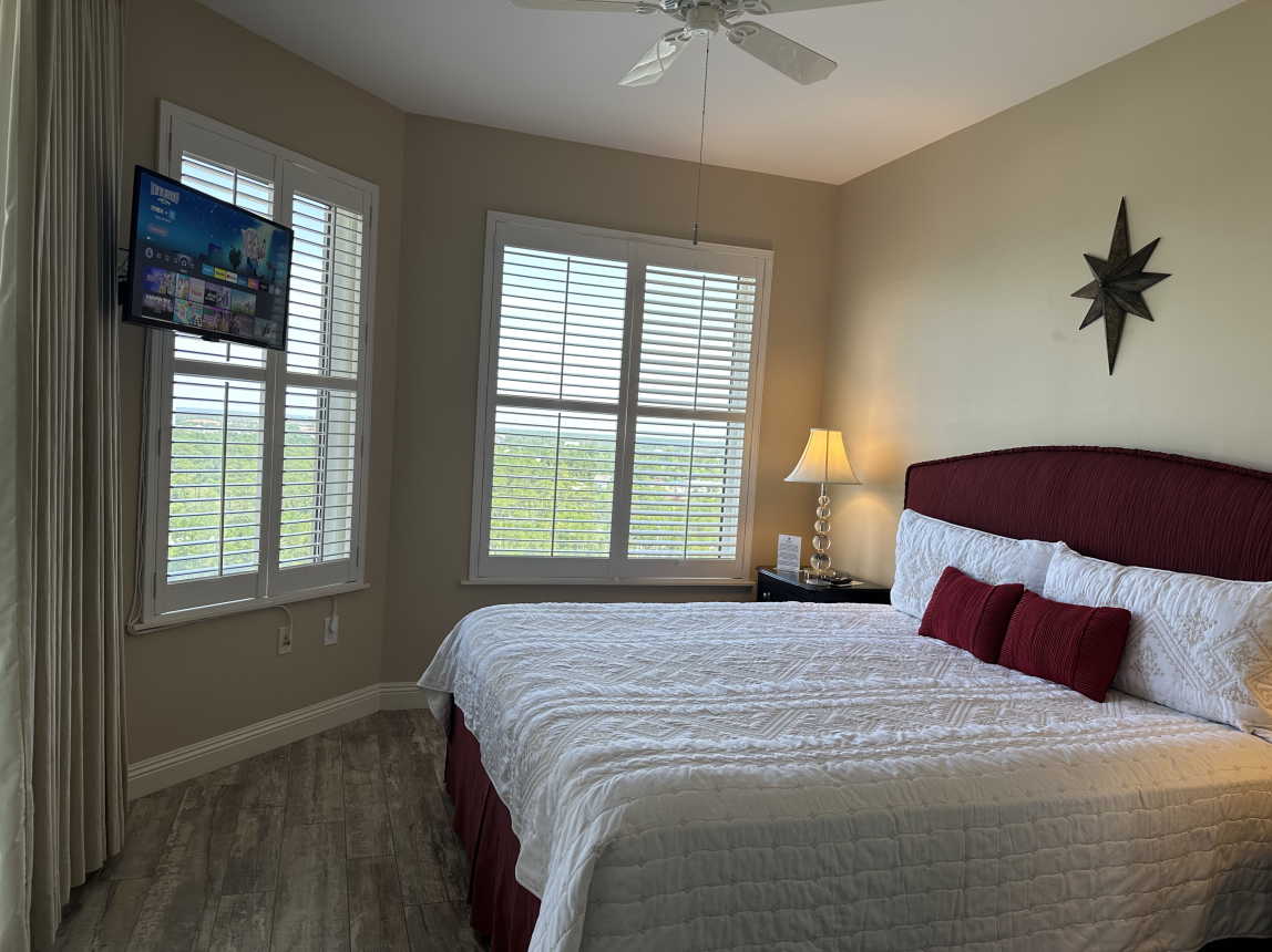 King Size Bed in Guest Room, Wall Mounted TV