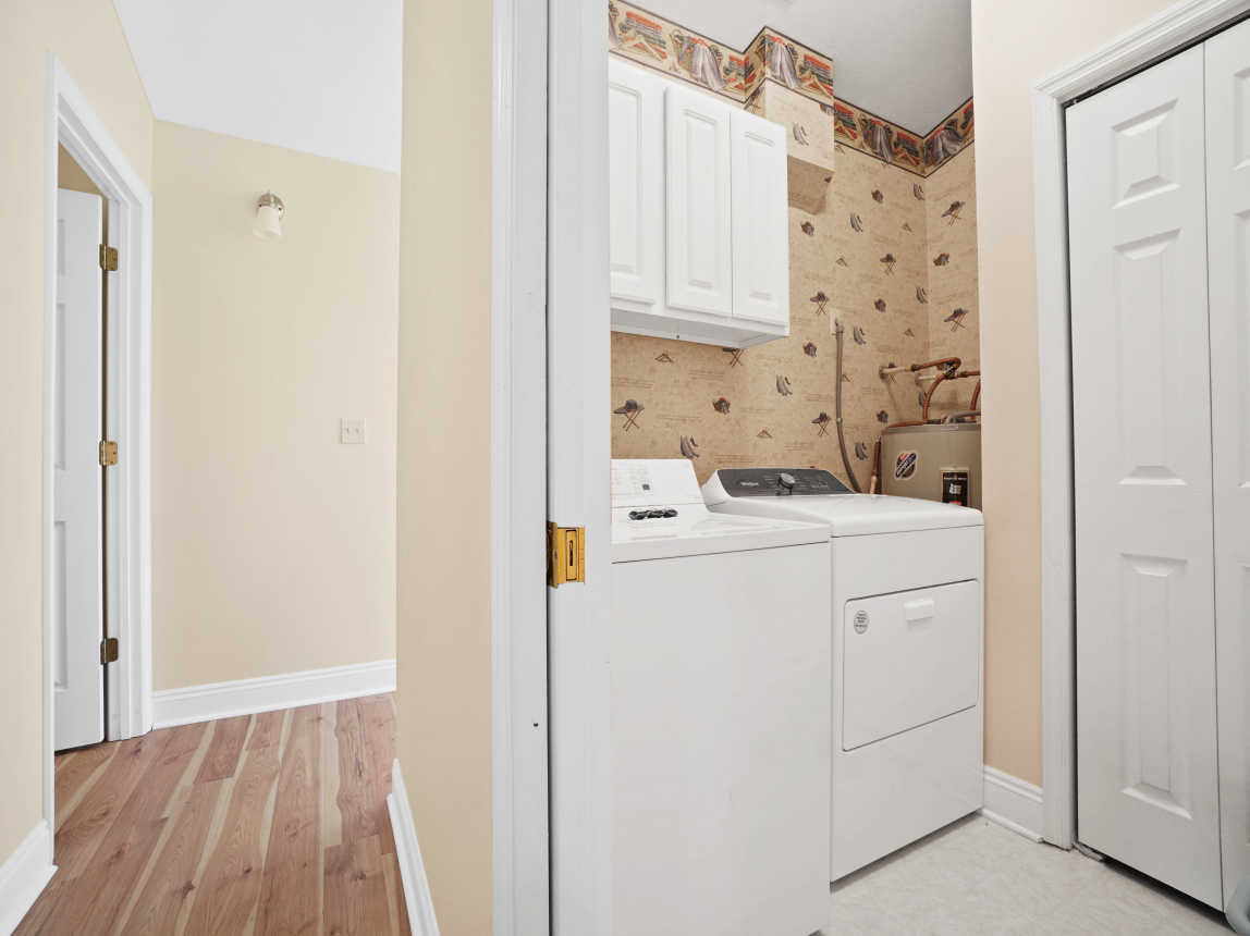 Upstairs hall laundry room.