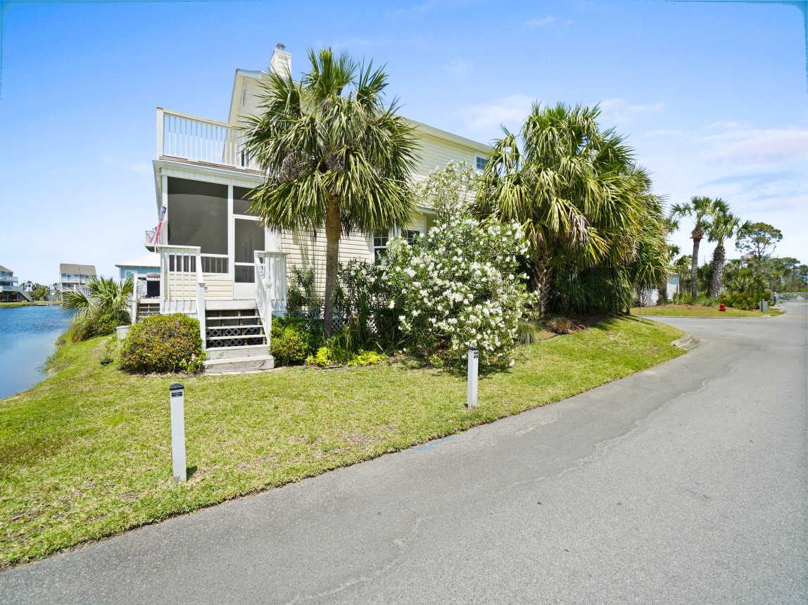 Screened back porch overlooking the little pond.