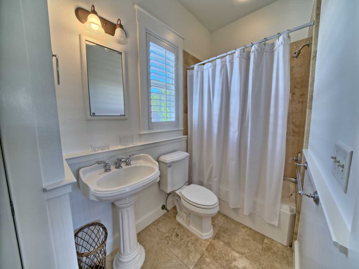 2nd Floor Queen Bedroom full bathroom with shower and tub.