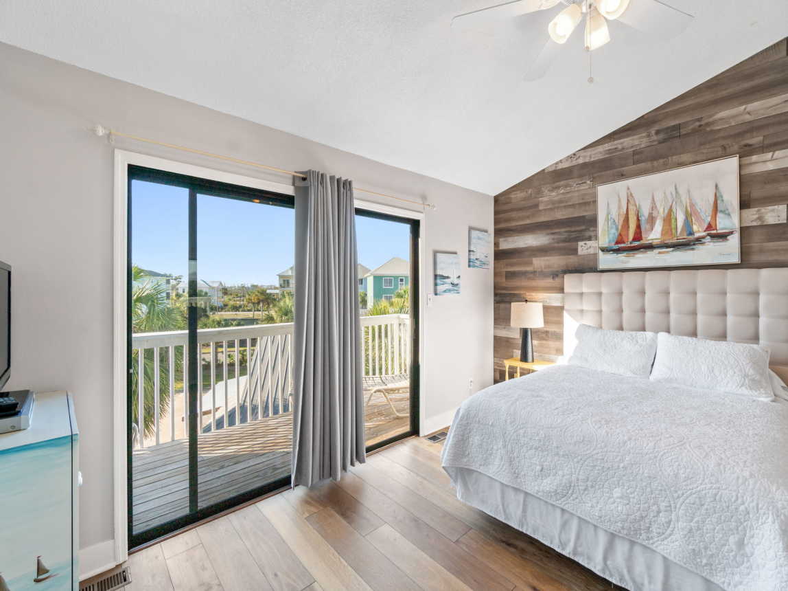 Queen bed with porch that features two loungers. Enjoy your coffee or a book! 