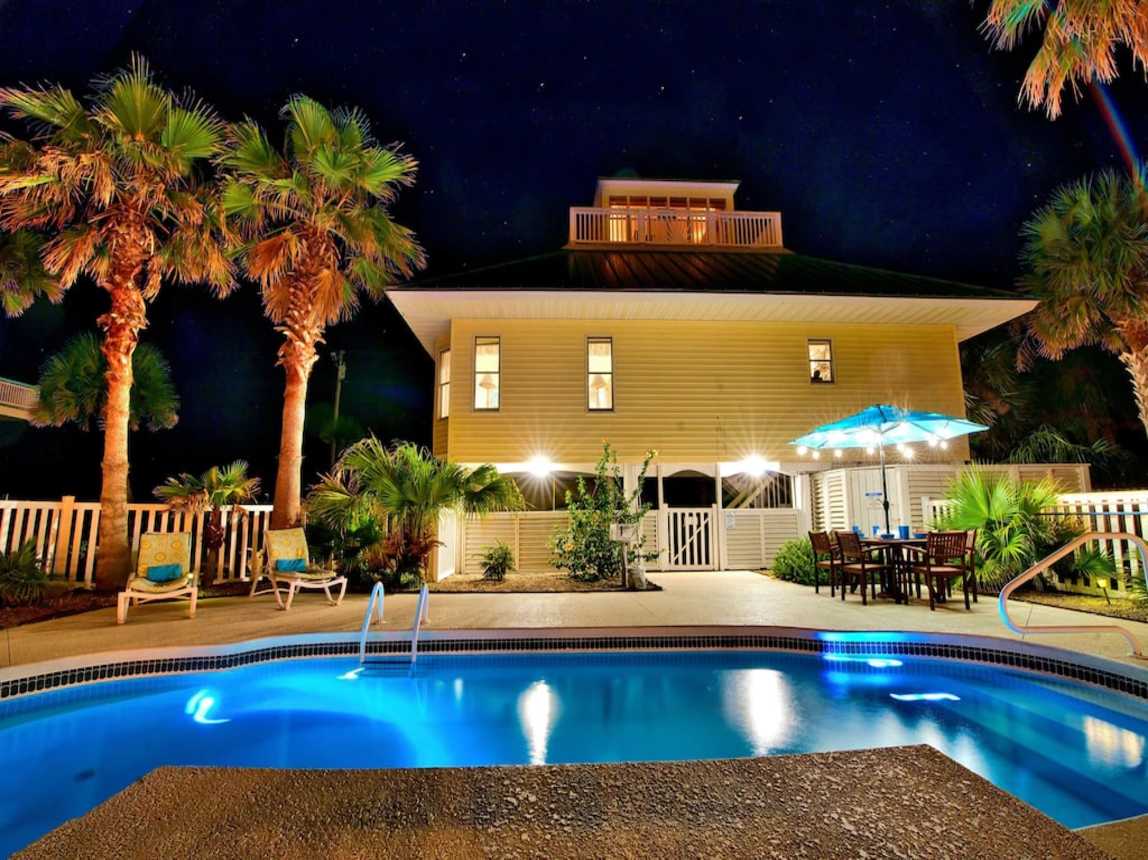Nighttime view of Sea Breeze pool area