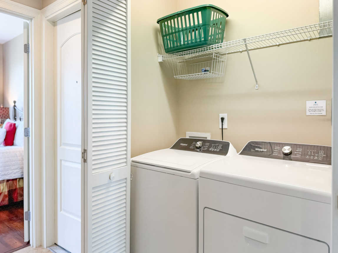 Full size washer and dryer inside the condo.