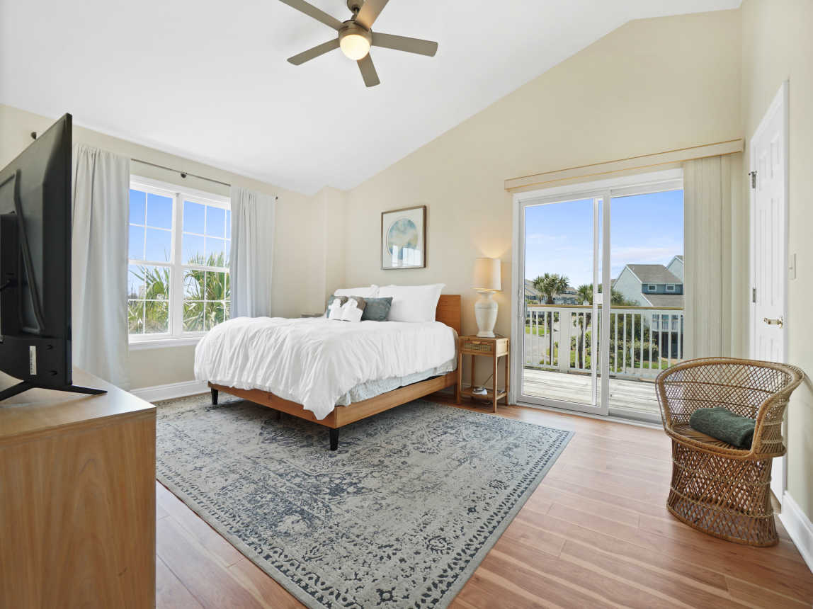 Upstairs master suite; king bed, deck, en suite bathroom with shower.