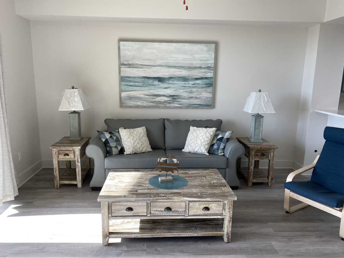 Relax in the soft colors of the sea in Crabby' Cove - Watch the 70" Samsung TV!