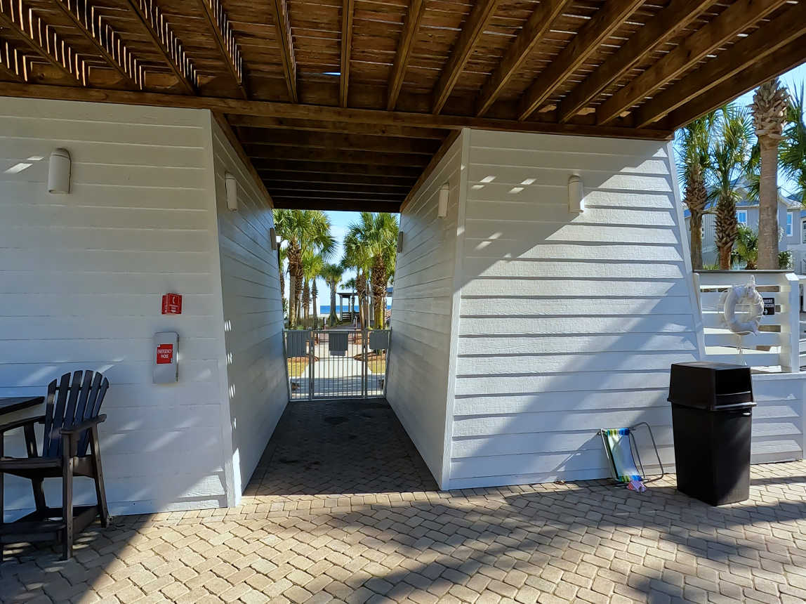 Cottages at Romar C3 Pool Area Bathrooms and Exit to Beach Access