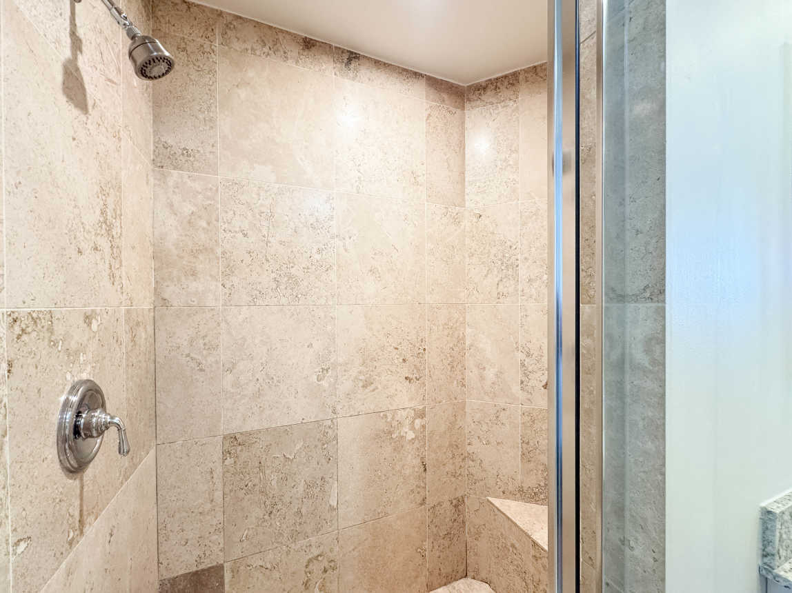 Travertine super clean private shower in master suite