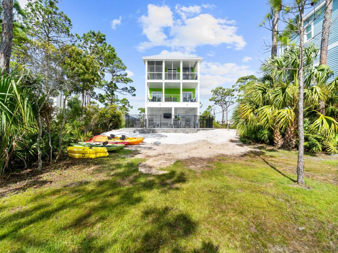 Belle from the bay side. Pool area, kayaks and room to enjoy!