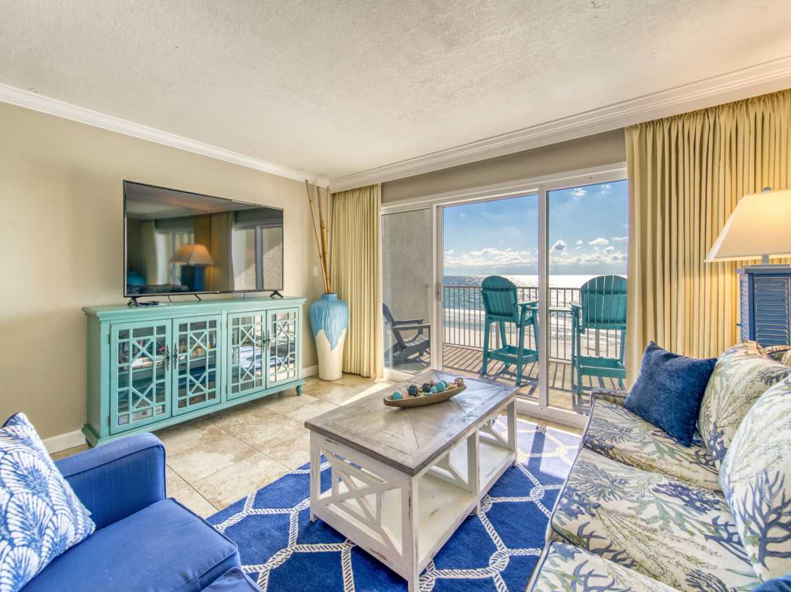 Relax in the comfy living area with stunning Gulf views!