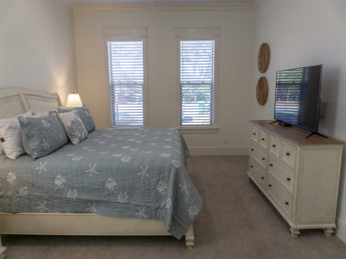 King Master Bedroom on first floor with full bath. All new bedding and linens.