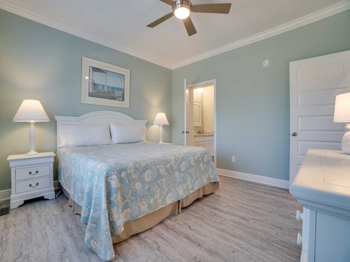 Master King bedroom with 55" smart tv and bath.