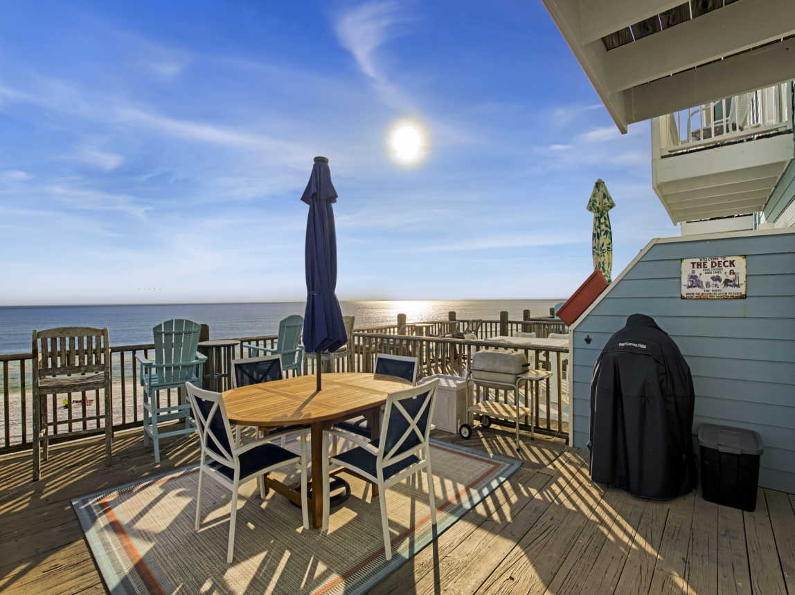 Deck with charcoal grill and lump charcoal egg smoker 