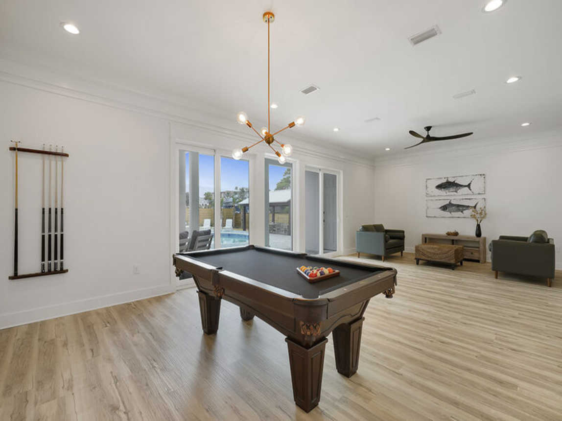 Deja Blue - Extravagant Vacation Beach House with Private Pool with Swim Up Bar, Putting Green, Sand Volleyball, and Rooftop Grill in Blue Mountain Beach, Florida - Five Star Properties Destin/30A