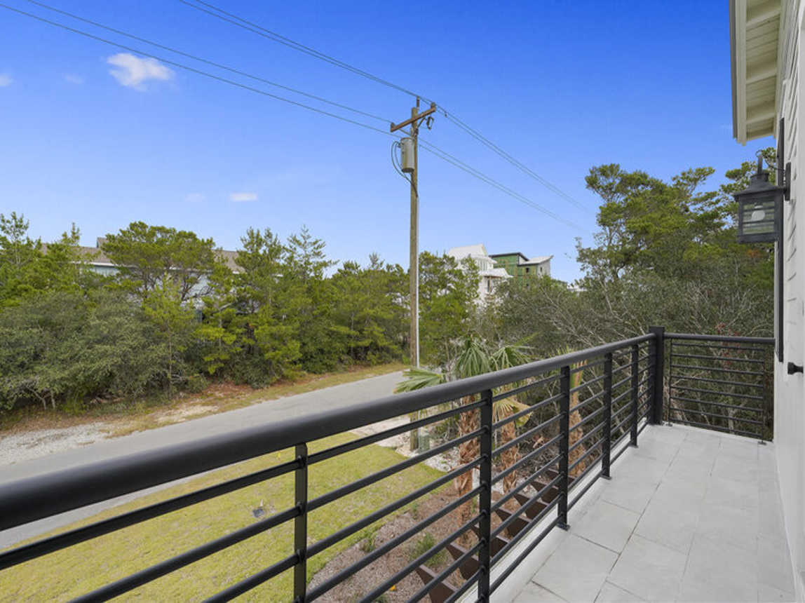 Deja Blue - Extravagant Vacation Beach House with Private Pool with Swim Up Bar, Putting Green, Sand Volleyball, and Rooftop Grill in Blue Mountain Beach, Florida - Five Star Properties Destin/30A