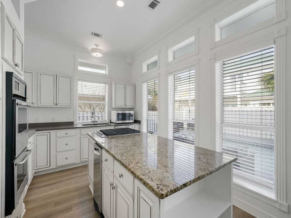 Lazy Bones - Luxury Beach Vacation Rental House with Private Pool, Hot Tub, and Wraparound Balconies in Crystal Beach, Florida - Five Star Properties Destin/30A