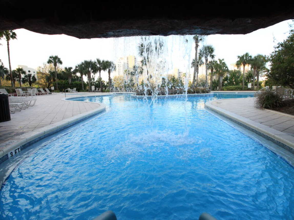 Pool waterfall that you can swim under or walk behind