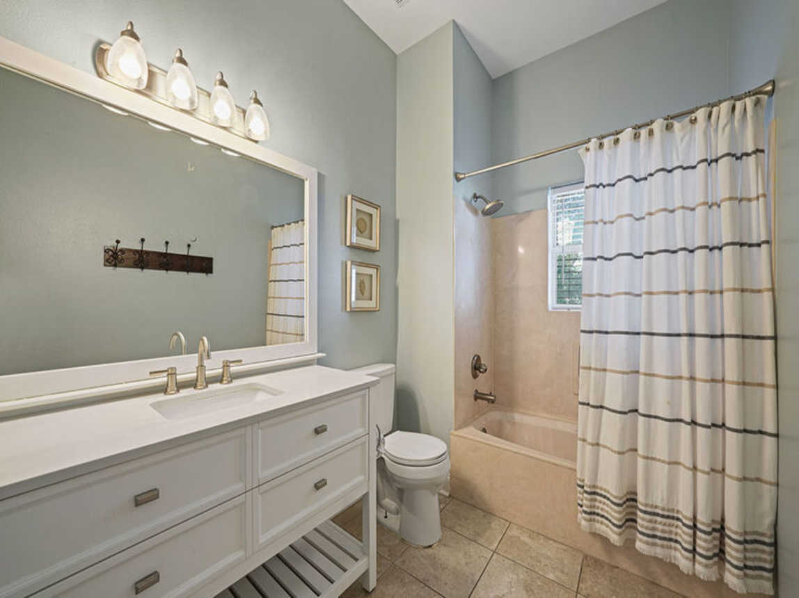 Flirty Flamingo - Pet-Friendly Vacation Rental House Near Beach with Game Room, Private Pool, & Carriage House in Crystal Beach, Florida  - Five Star Properties Destin/30A