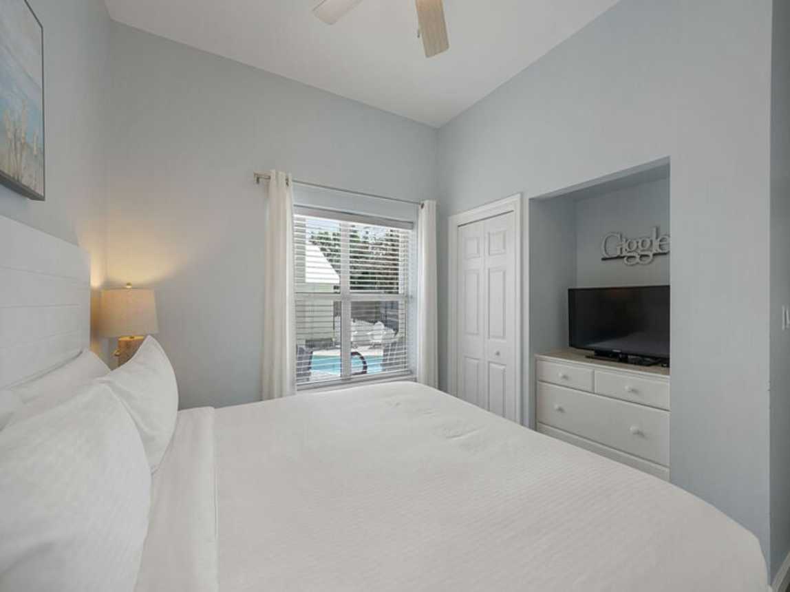 Flirty Flamingo - Pet-Friendly Vacation Rental House Near Beach with Game Room, Private Pool, & Carriage House in Crystal Beach, Florida  - Five Star Properties Destin/30A