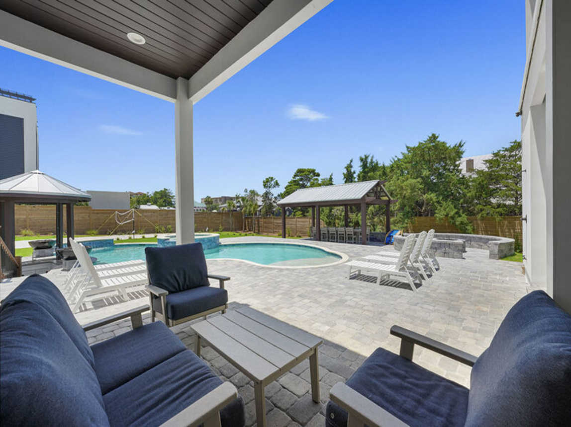 Deja Blue - Extravagant Vacation Beach House with Private Pool with Swim Up Bar, Putting Green, Sand Volleyball, and Rooftop Grill in Blue Mountain Beach, Florida - Five Star Properties Destin/30A