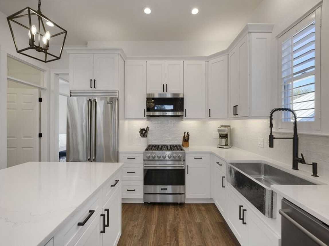 The Hummingbird - Luxury Lakefront Vacation Rental with Private Pool, Fireplace, and Water Views on Holiday Isle in Destin, Florida - Five Star Properties Destin/30A