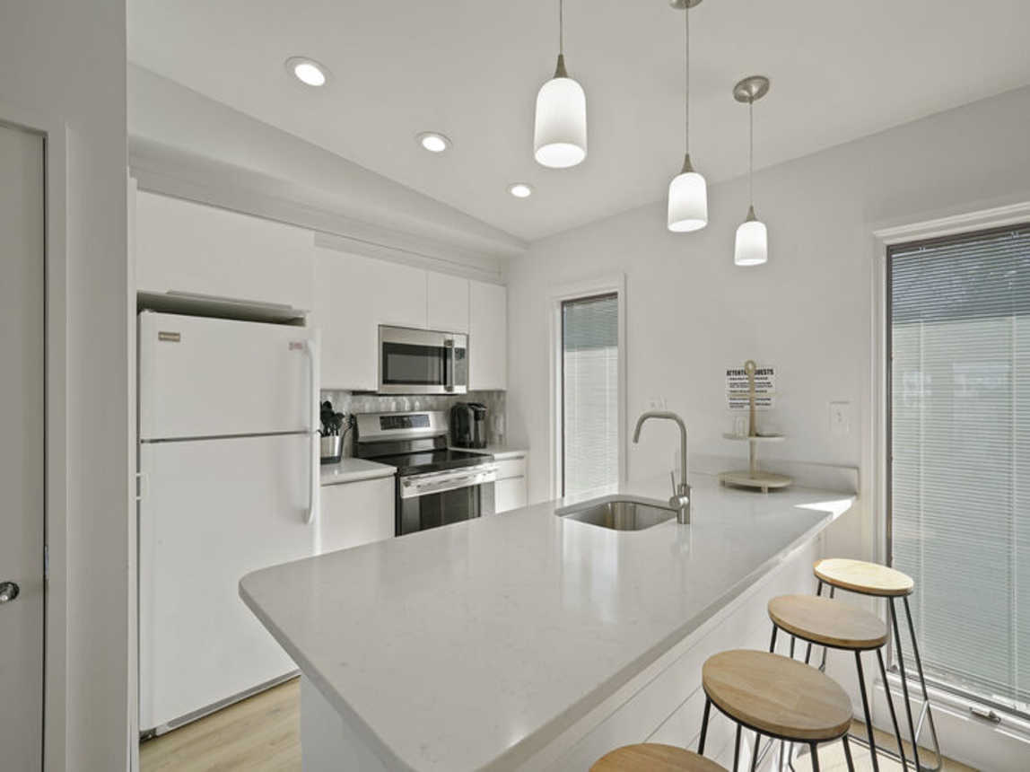 The Boat House - Beautiful Waterfront Vacation Rental with Boat Dock and Amazing Views from the Balcony on Holiday Isle in Destin, Florida - Five Star Properties Destin/30A