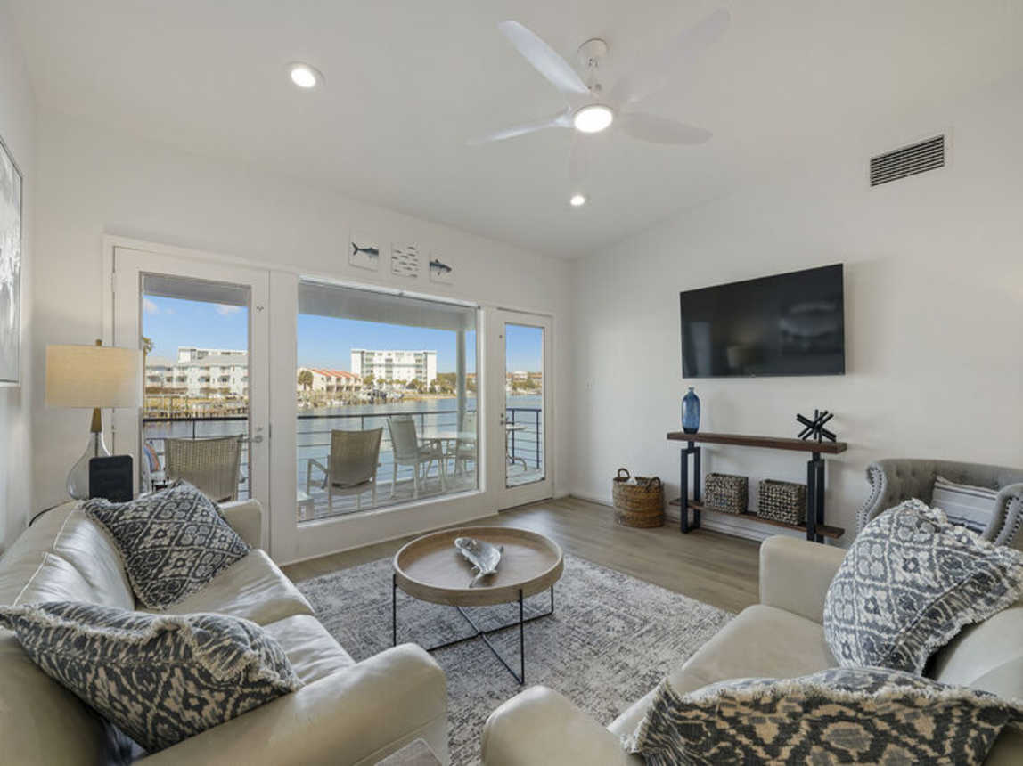 The Boat House - Beautiful Waterfront Vacation Rental with Boat Dock and Amazing Views from the Balcony on Holiday Isle in Destin, Florida - Five Star Properties Destin/30A