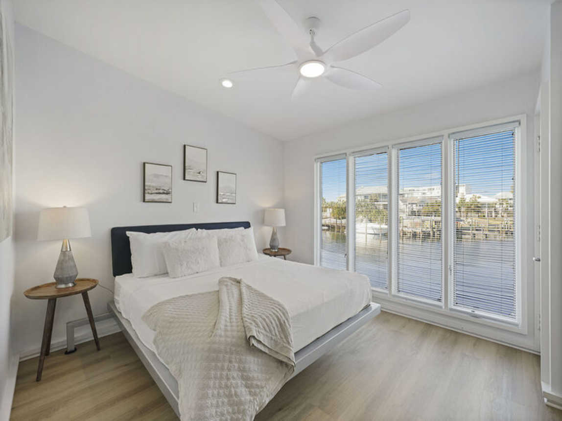 The Boat House - Beautiful Waterfront Vacation Rental with Boat Dock and Amazing Views from the Balcony on Holiday Isle in Destin, Florida - Five Star Properties Destin/30A