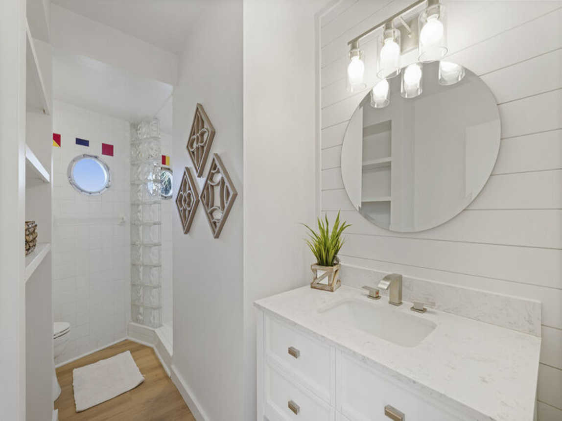 The Boat House - Beautiful Waterfront Vacation Rental with Boat Dock and Amazing Views from the Balcony on Holiday Isle in Destin, Florida - Five Star Properties Destin/30A