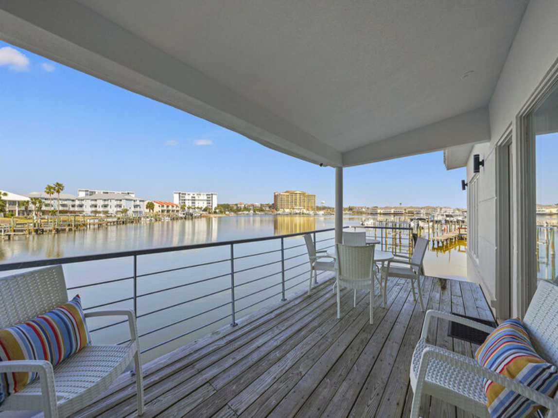 The Boat House - Beautiful Waterfront Vacation Rental with Boat Dock and Amazing Views from the Balcony on Holiday Isle in Destin, Florida - Five Star Properties Destin/30A